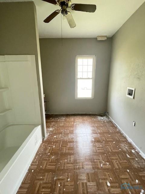 3223 Maple St, Toledo, OH 43608 - spare room with ceiling fan and baseboards