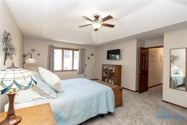 2439 Notting Hill Rd, Toledo, OH 43617 - bedroom featuring light colored carpet, baseboards, and a ceiling fan