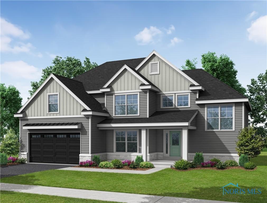 144 Barton Creek Dr, Perrysburg, OH 43551 - view of front of property with board and batten siding, a garage, driveway, and a front lawn