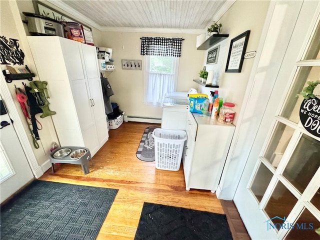 1520 S Clinton St, Defiance, OH 43512 - laundry room featuring wood finished floors, crown molding, a baseboard radiator, and wooden ceiling