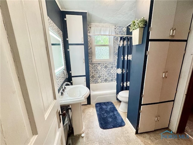 1520 S Clinton St, Defiance, OH 43512 - full bathroom with toilet, shower / tub combo with curtain, and tile patterned flooring