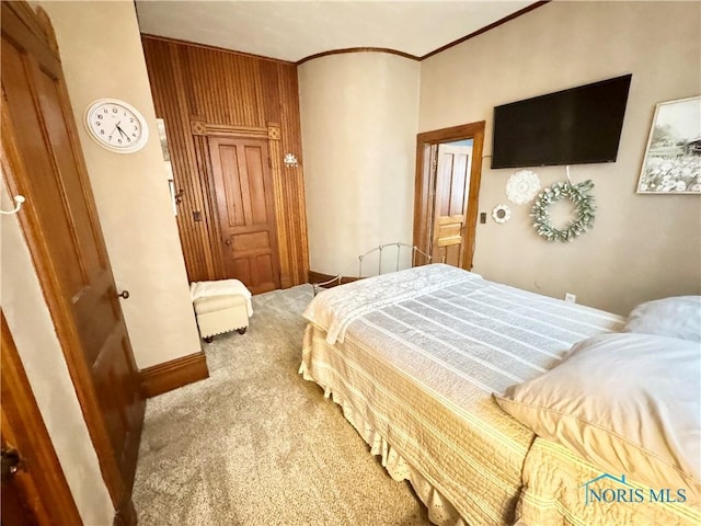 1520 S Clinton St, Defiance, OH 43512 - carpeted bedroom featuring ornamental molding and baseboards