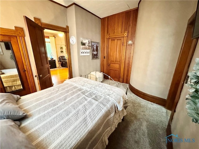 1520 S Clinton St, Defiance, OH 43512 - bedroom with carpet floors, baseboards, and ornamental molding