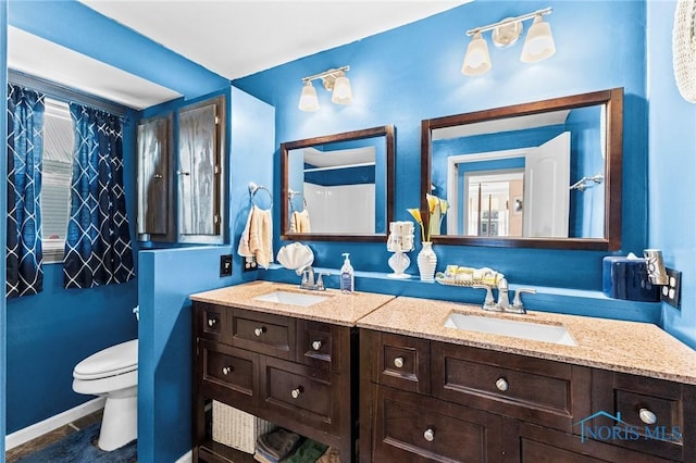 254 N Worthy St, Marblehead, OH 43440 - bathroom with double vanity and toilet