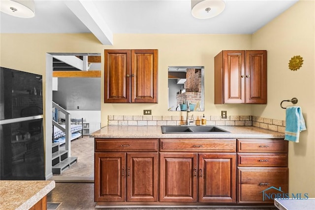 254 N Worthy St, Marblehead, OH 43440 - kitchen featuring light countertops and brown cabinetry