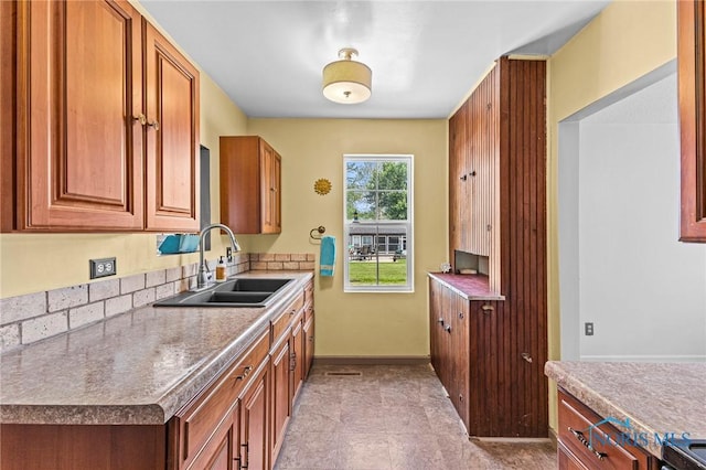 254 N Worthy St, Marblehead, OH 43440 - kitchen with a sink and brown cabinetry