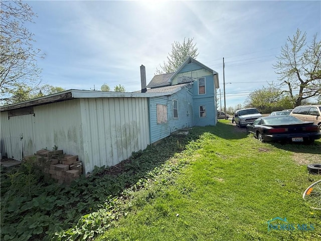 232 N Findlay Pike, Portage, OH 43451 - view of home's exterior featuring a yard