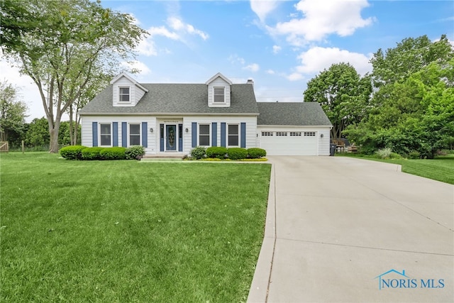 826 Touraine Ave, Bowling Green, OH 43402 - cape cod-style house with driveway, a front yard, an attached garage, a shingled roof, and a chimney