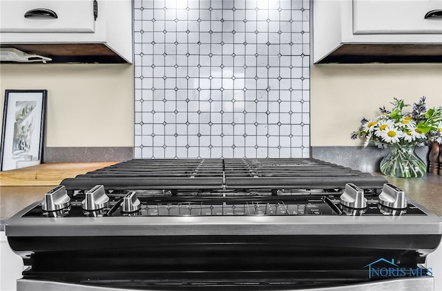826 Touraine Ave, Bowling Green, OH 43402 - kitchen view of tasteful backsplash and white cabinets