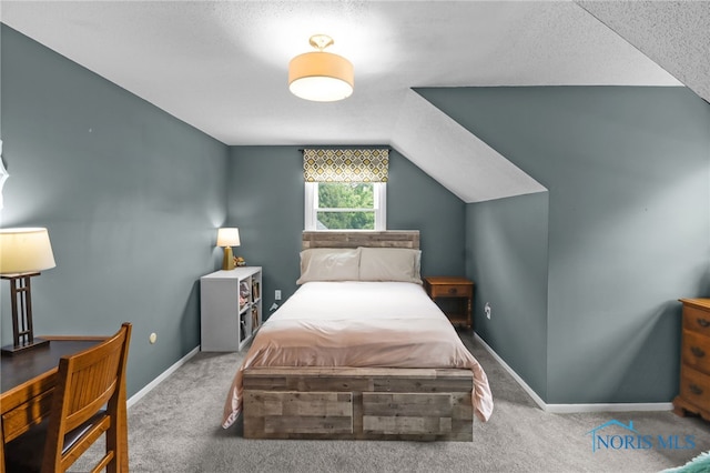 826 Touraine Ave, Bowling Green, OH 43402 - carpeted bedroom featuring vaulted ceiling and baseboards