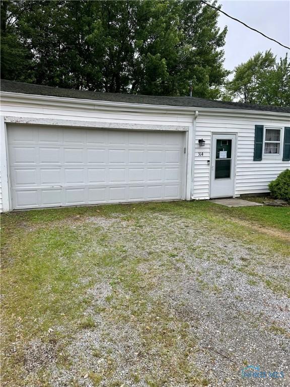 314 Jewett Ave, North Baltimore, OH 45872 - garage with driveway