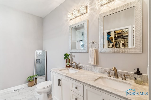 1209 Apache Dr, Wauseon, OH 43567 - bathroom featuring marble finish flooring and double vanity