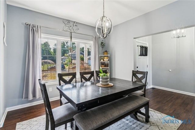 1209 Apache Dr, Wauseon, OH 43567 - dining area featuring a chandelier and wood finished floors
