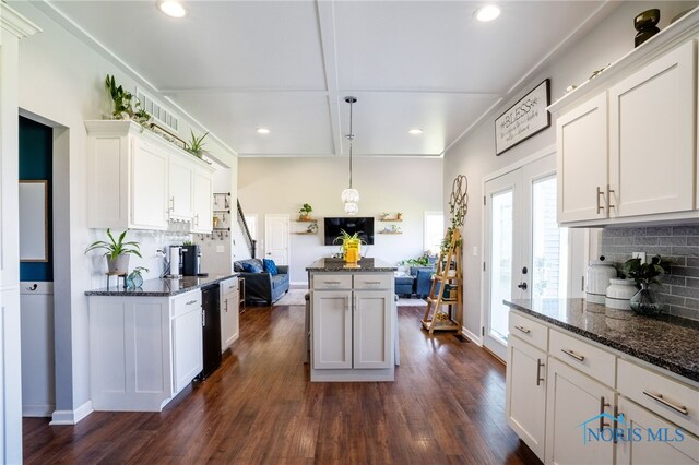 1209 Apache Dr, Wauseon, OH 43567 - kitchen with backsplash, recessed lighting, dark stone counters, dark wood-style flooring, and white cabinetry