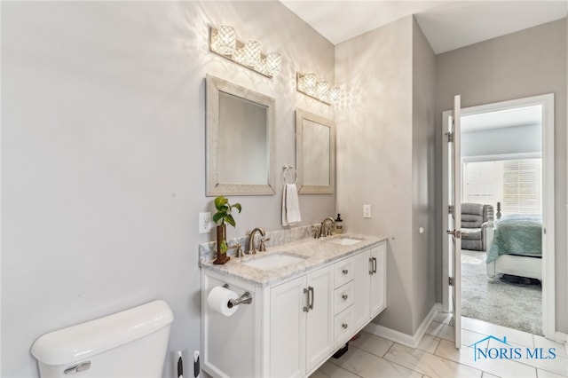 1209 Apache Dr, Wauseon, OH 43567 - full bathroom with double vanity and connected bathroom