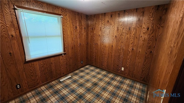2384 State Route 109, Delta, OH 43515 - empty room featuring wooden walls