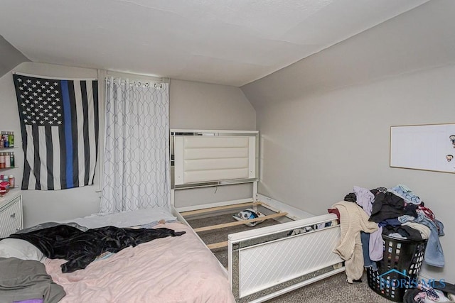 2721 Fremont St, Toledo, OH 43605 - carpeted bedroom featuring lofted ceiling