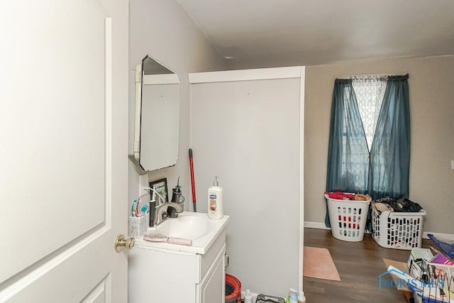 2721 Fremont St, Toledo, OH 43605 - bathroom with vanity and wood finished floors