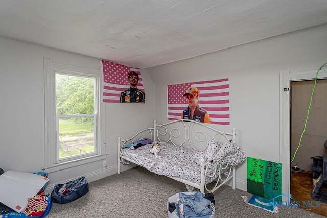 2721 Fremont St, Toledo, OH 43605 - carpeted bedroom featuring baseboards