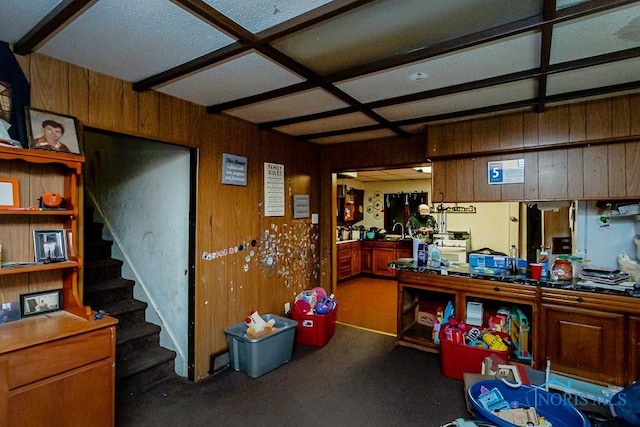2602 Fremont St, Toledo, OH 43605 - misc room with stairs, a sink, and wood walls