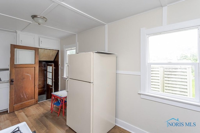 635 Plymouth St, Toledo, OH 43605 - kitchen featuring freestanding refrigerator and wood finished floors