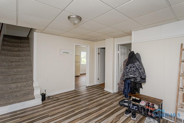 635 Plymouth St, Toledo, OH 43605 - interior space with wood finished floors, a paneled ceiling, and baseboards