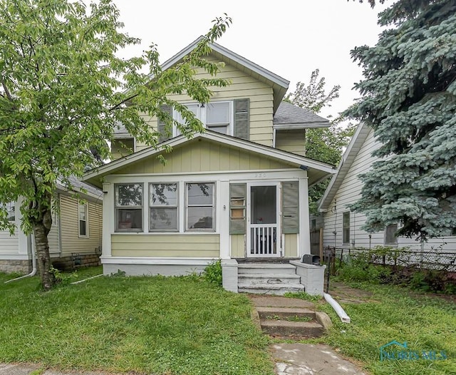 230 Heffner St, Toledo, OH 43605 - view of front of home with board and batten siding and roof with shingles