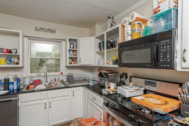 230 Heffner St, Toledo, OH 43605 - kitchen featuring appliances with stainless steel finishes, open shelves, a sink, and dark countertops