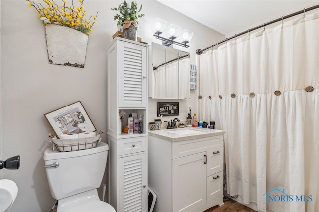 8399 W State Route 12, Fostoria, OH 44830 - full bath with toilet, vanity, and curtained shower