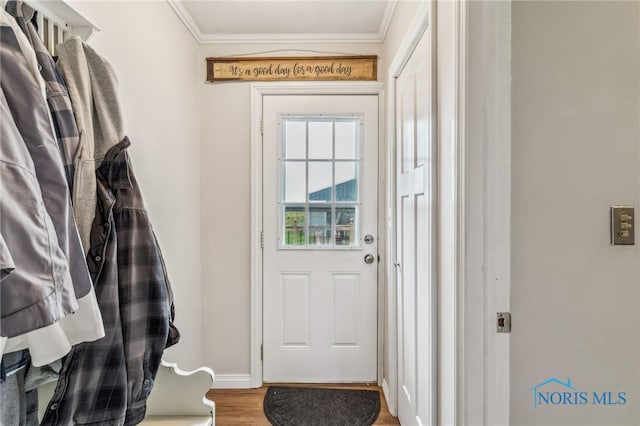 8399 W State Route 12, Fostoria, OH 44830 - entryway with ornamental molding, wood finished floors, and baseboards