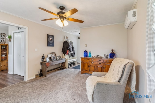 8399 W State Route 12, Fostoria, OH 44830 - living area with a wall mounted AC, crown molding, carpet flooring, ceiling fan, and baseboards