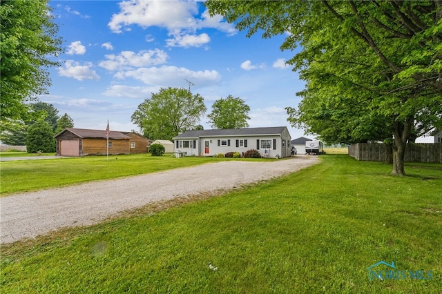 8399 W State Route 12, Fostoria, OH 44830 - single story home with gravel driveway