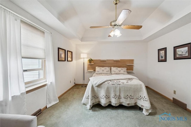 2543 Broadway St Unit 2543, Toledo, OH 43609 - bedroom featuring a tray ceiling, carpet, baseboards, and ceiling fan