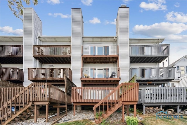 2543 Broadway St Unit 2543, Toledo, OH 43609 - rear view of property with stairway