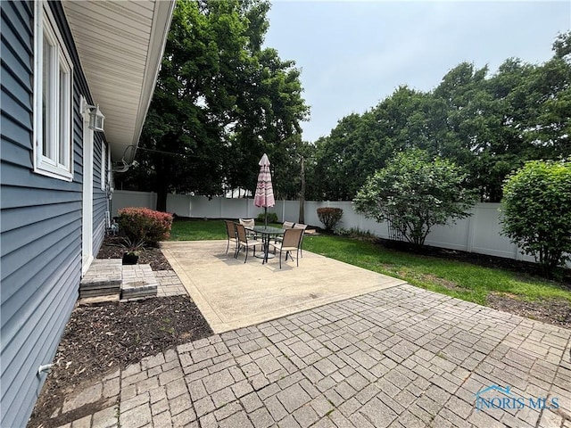 803 W Holland St, Archbold, OH 43502 - fenced backyard featuring a patio area and outdoor dining area
