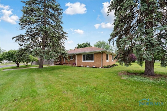 1240 Westgate Rd, Toledo, OH 43615 - single story home featuring a front yard and brick siding