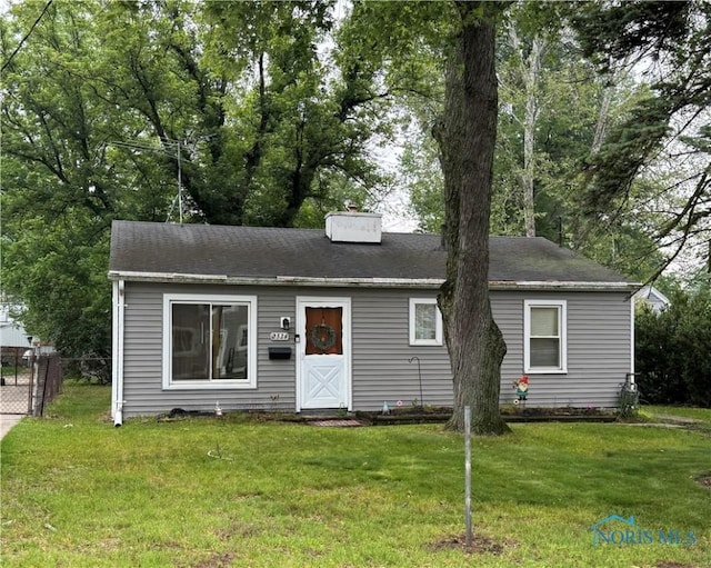 2534 Arletta St, Toledo, OH 43613 - view of front of house with a chimney