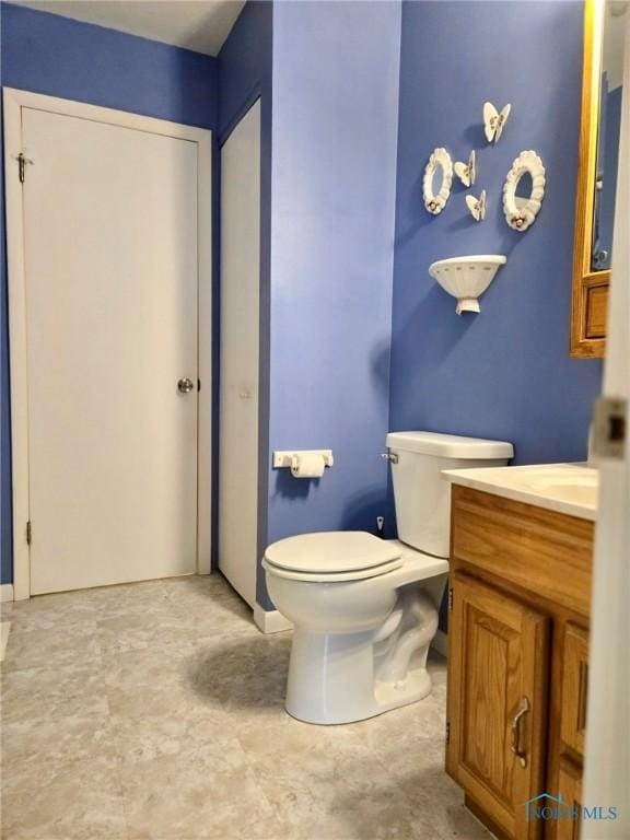 308 Jackson St, Delta, OH 43515 - bathroom with vanity and toilet