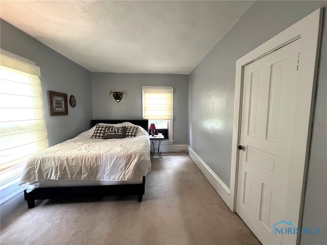 430 W Johnson St, Upper Sandusky, OH 43351 - bedroom with carpet floors and baseboards