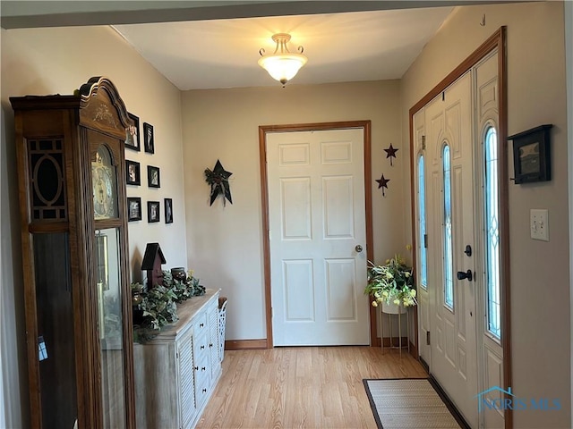 2546 State Route 66, Cloverdale, OH 45827 - foyer entrance featuring light wood-style flooring and baseboards