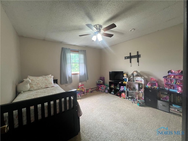 2546 State Route 66, Cloverdale, OH 45827 - carpeted bedroom featuring a textured ceiling and a ceiling fan