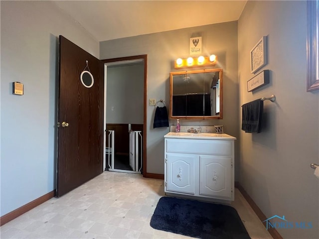 2546 State Route 66, Cloverdale, OH 45827 - bathroom with vanity, baseboards, and tile patterned floors