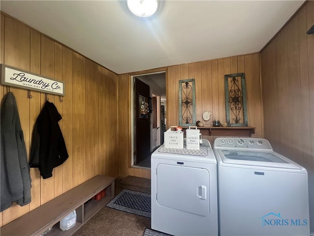 2546 State Route 66, Cloverdale, OH 45827 - laundry area with washer and dryer, wood walls, and carpet floors