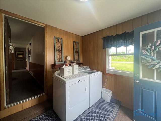 2546 State Route 66, Cloverdale, OH 45827 - laundry area with washing machine and clothes dryer, wooden walls, and light carpet