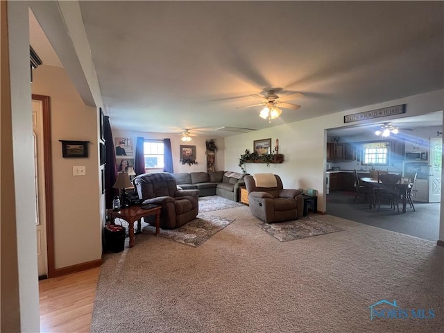 2546 State Route 66, Cloverdale, OH 45827 - living room featuring a ceiling fan and light colored carpet