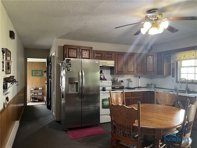 2546 State Route 66, Cloverdale, OH 45827 - kitchen with stainless steel fridge, under cabinet range hood, white electric range, ceiling fan, and a sink