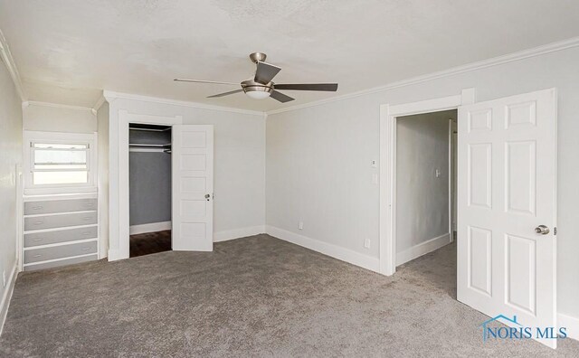 2740 Robinwood Ave, Toledo, OH 43610 - unfurnished bedroom with ornamental molding, carpet floors, a closet, and a ceiling fan