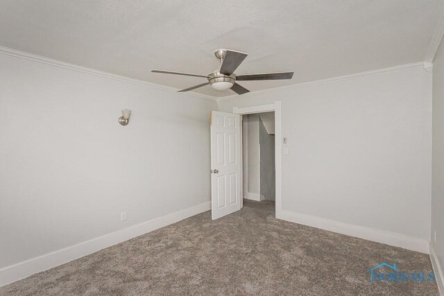 2740 Robinwood Ave, Toledo, OH 43610 - carpeted empty room featuring ornamental molding and ceiling fan