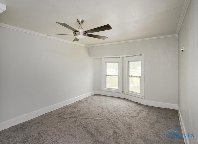 2740 Robinwood Ave, Toledo, OH 43610 - unfurnished room featuring ornamental molding, carpet floors, and a ceiling fan