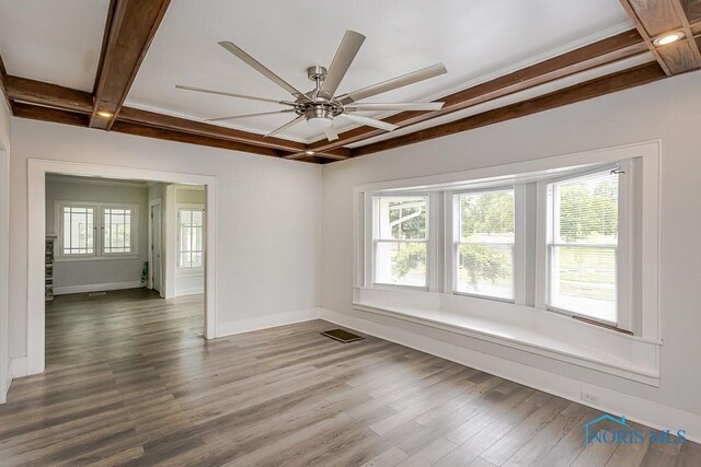 2740 Robinwood Ave, Toledo, OH 43610 - unfurnished room with coffered ceiling, beam ceiling, wood finished floors, and a ceiling fan